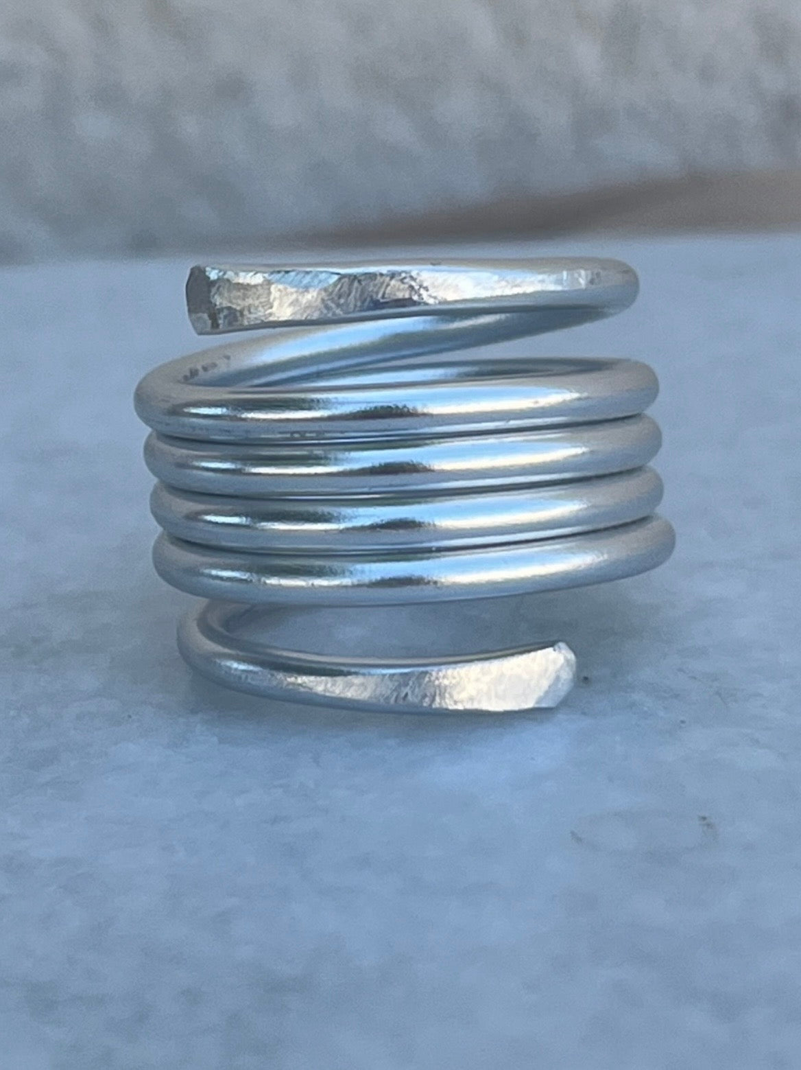Bague ajustable inoxydable tendance " Ressort"